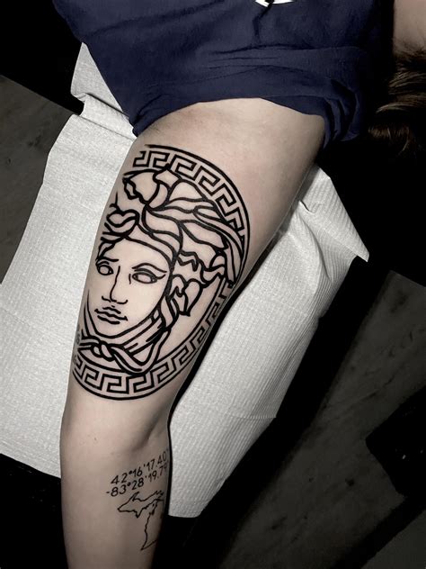 versace symbol tattoo|tattoos on vagina of medusa.